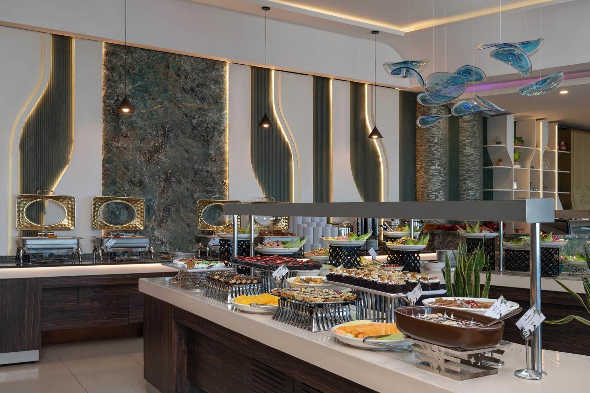 Titanic Hotel & Spa Sulaymaniyah Exterior photo A buffet at a hotel